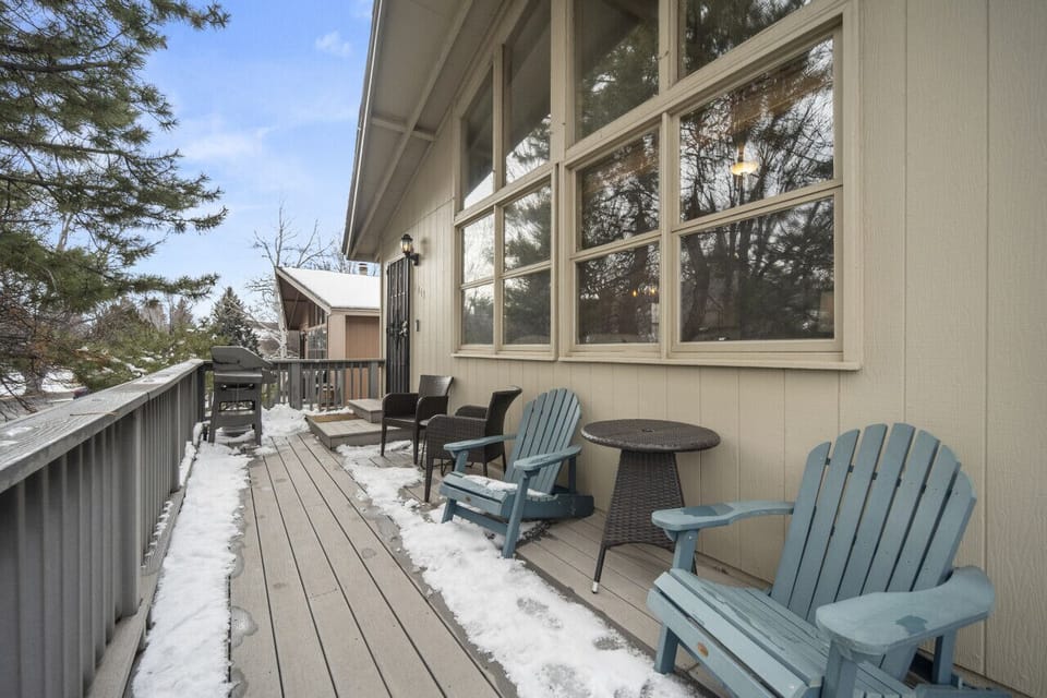 The deck area with seating for four