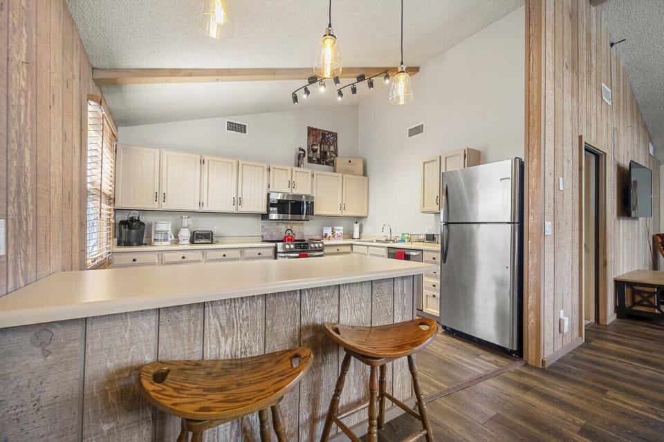 Kitchen seating area provides barstool seating for two