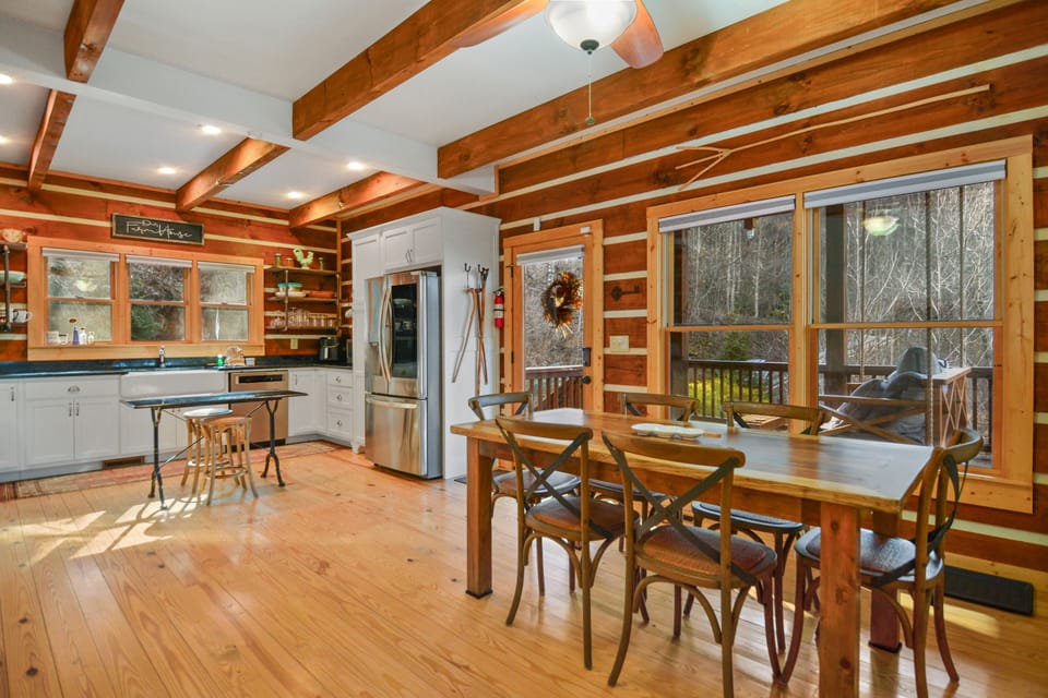 Kitchen and open concept dinning space with outdoor swing 