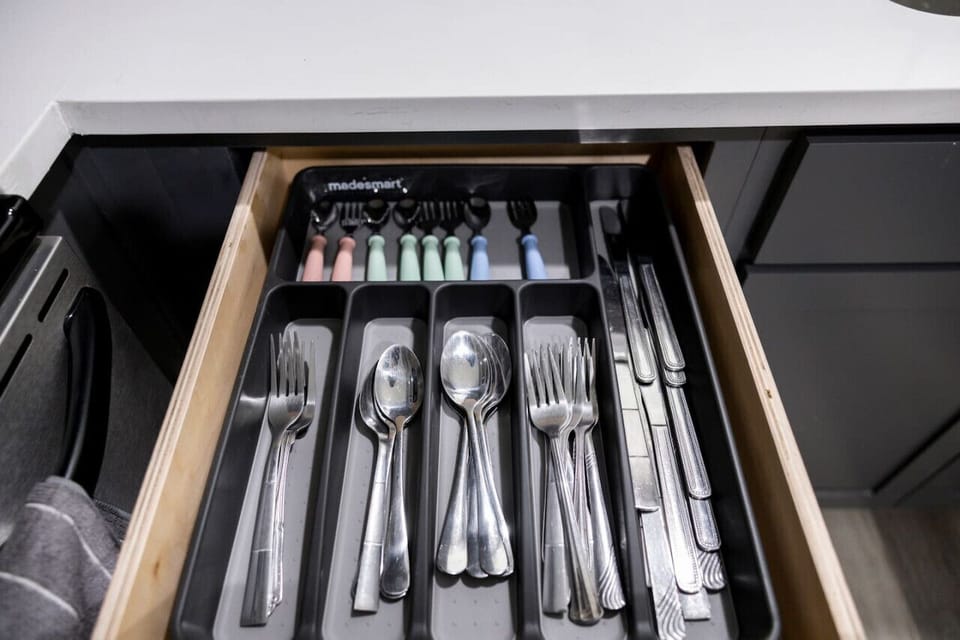 Fully stocked kitchen with all the essentials! Enjoy a hassle-free stay with neatly organized silverware and kid-friendly utensils, making mealtime effortless and enjoyable.