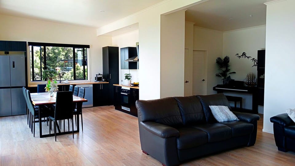 Sink into comfort in our open-plan lounge, featuring two large leather sofas.