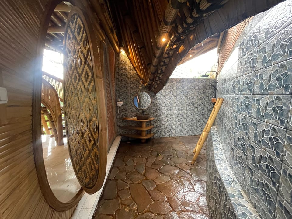 Family Bungalow, 2 Bedrooms, Balcony, River View | Bathroom | Shower, rainfall showerhead, free toiletries, hair dryer