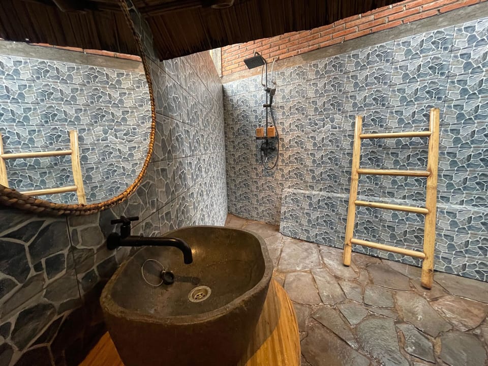 Family Bungalow, 2 Bedrooms, Balcony, River View | Bathroom | Shower, rainfall showerhead, free toiletries, hair dryer