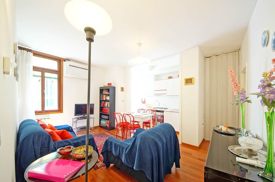 Apartment | Living area | 32-inch flat-screen TV with satellite channels
