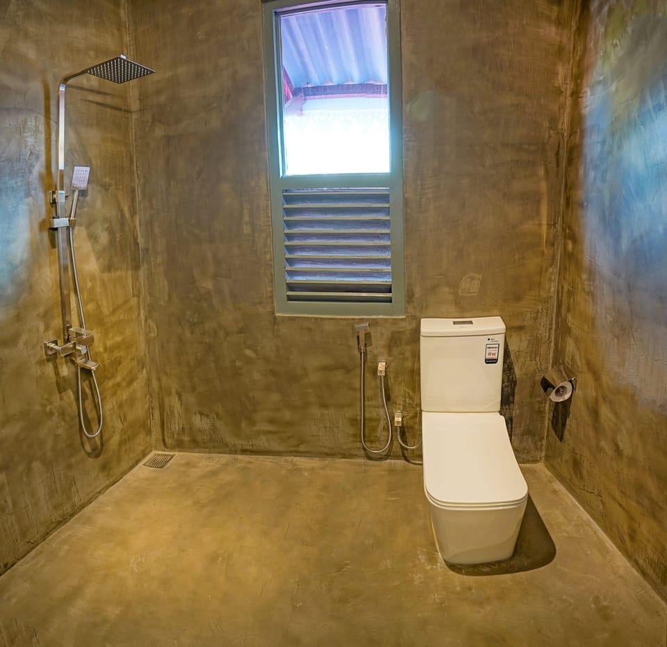 Deluxe Double or Twin Room, 1 King Bed, Non Smoking, Ocean View | Bathroom | Combined shower/tub, rainfall showerhead, hair dryer, bathrobes