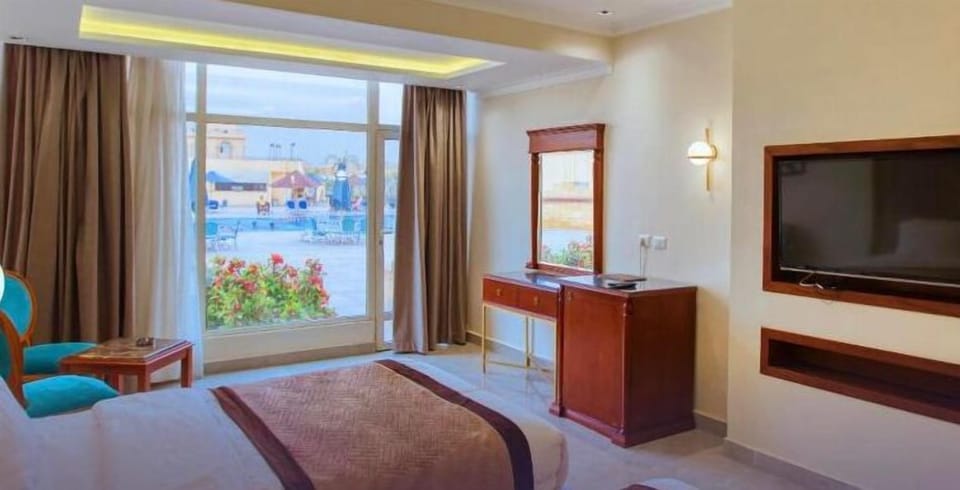 Basic Room, 2 Bedrooms, Pool View | 1 bedroom, desk, laptop workspace, bed sheets