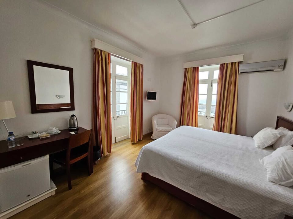 Desk, laptop workspace, free WiFi, bed sheets