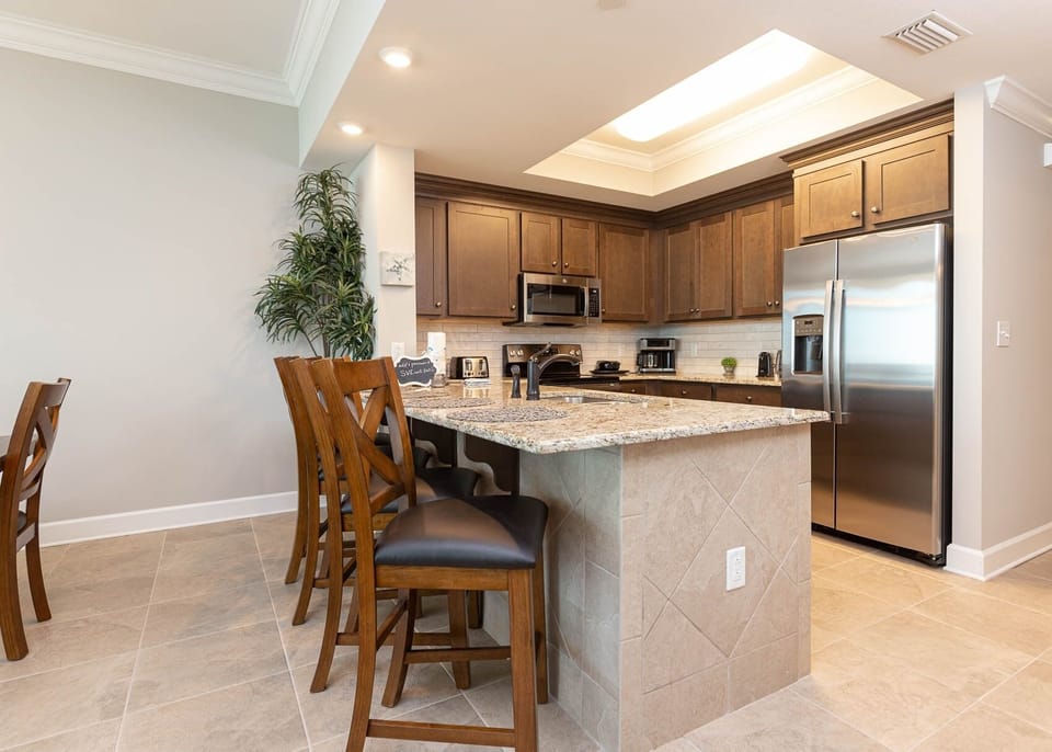 Condo, 2 Bedrooms | Private kitchen | Fridge, oven, coffee/tea maker