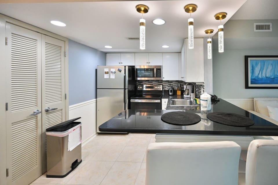 A sleek, modern kitchen with stainless steel appliances
