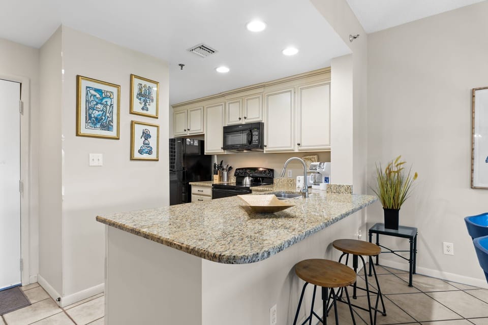Cook with ease in this large kitchen, stocked with all the essentials.