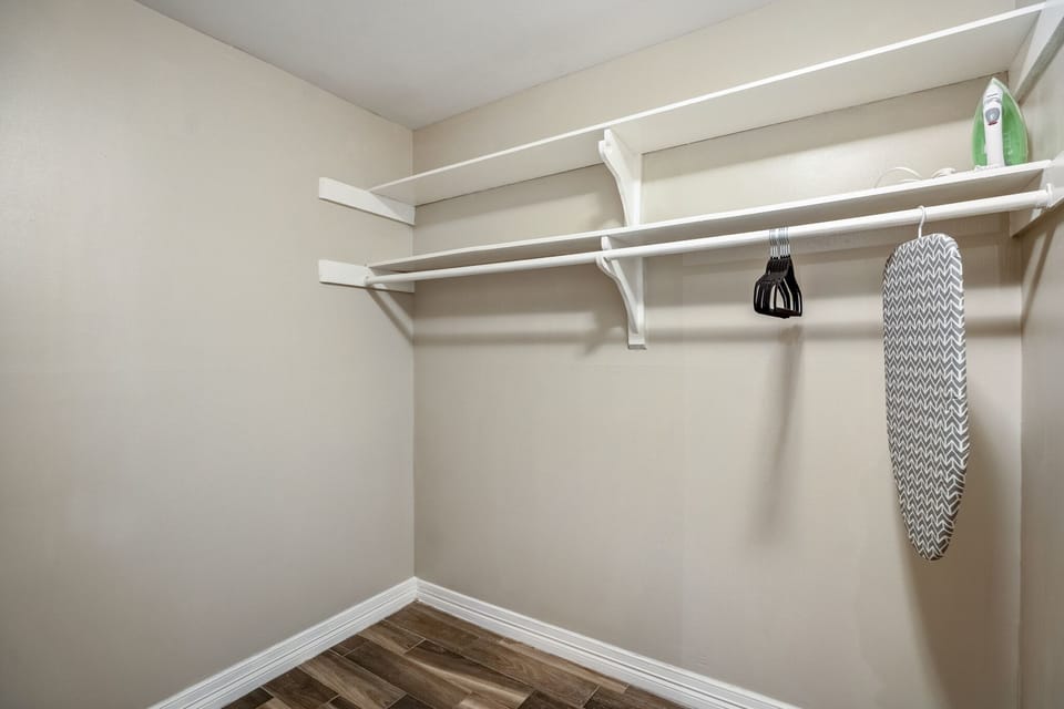 Discover the ultimate storage solution in our lavish walk-in closet