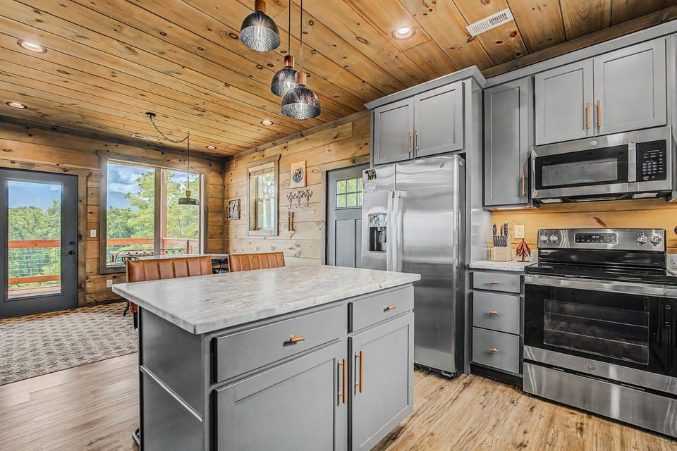The kitchen island adds prep space and casual seating.