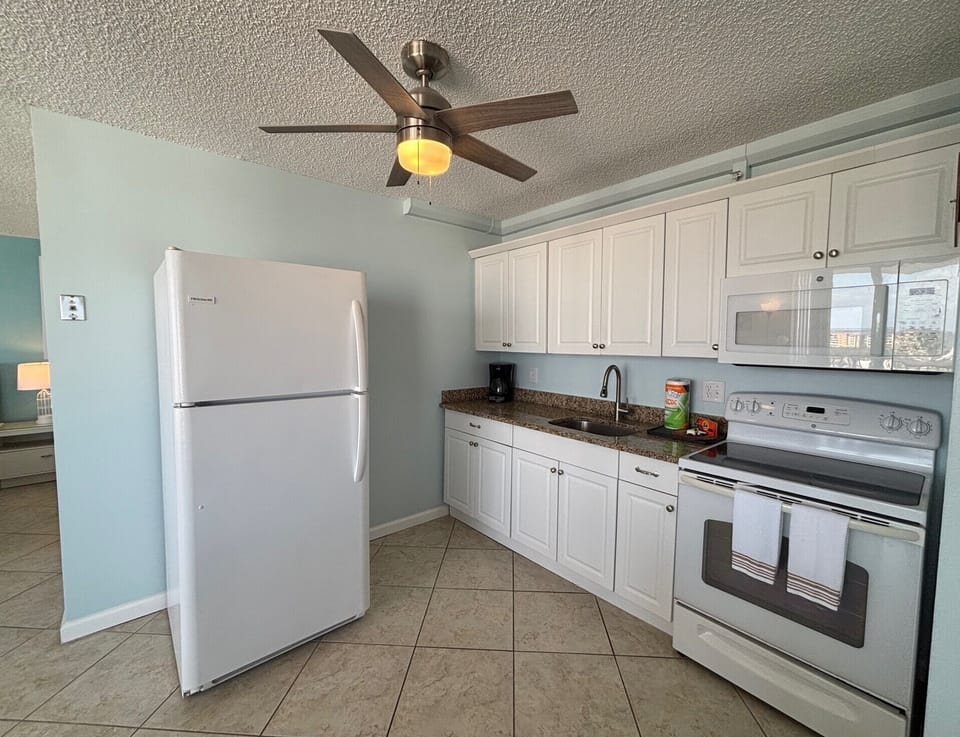 The well-appointed kitchen has all the essentials you need for dining in.