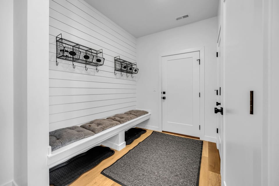 Mudroom off of garage. Great place to dry ski boots/wet hats and gloves