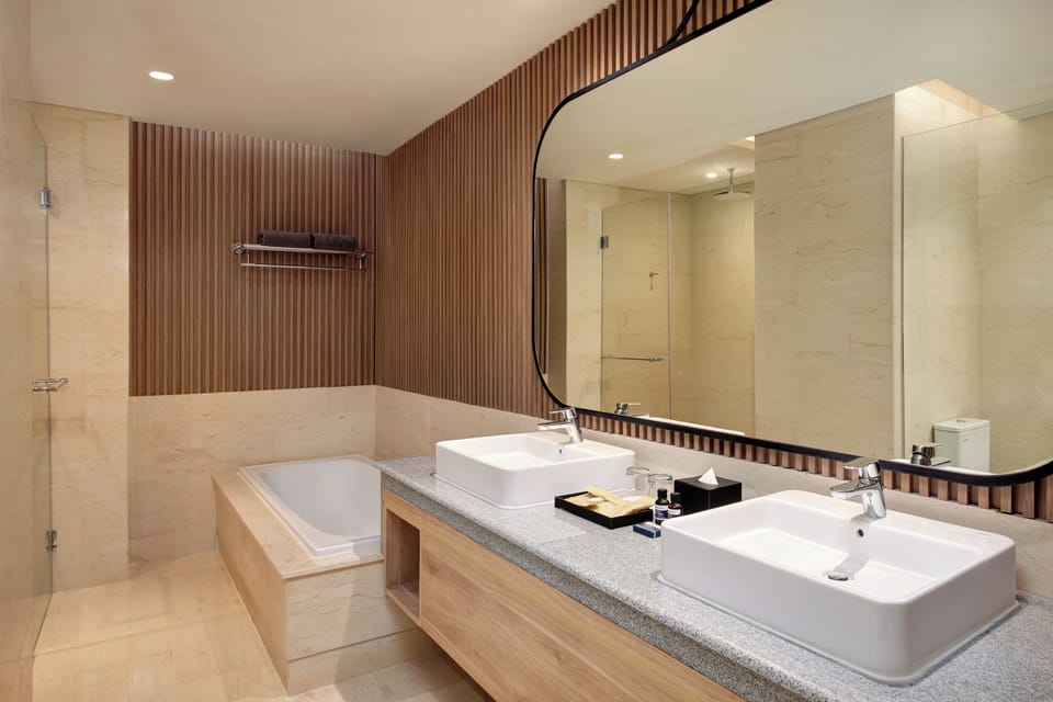 Suite, 1 Queen Bed | Bathroom | Shower, rainfall showerhead, hair dryer, slippers