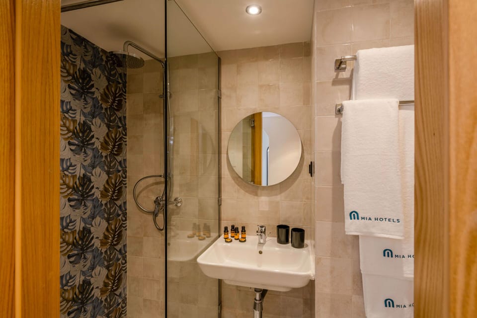 Bathrobes, slippers, towels, soap
