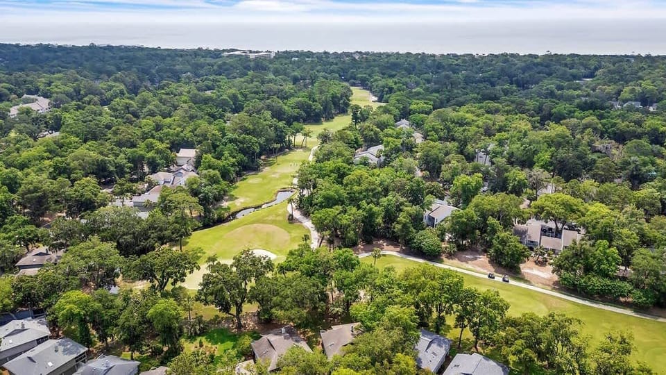 Aerial Above Home Overlooking Golf Course