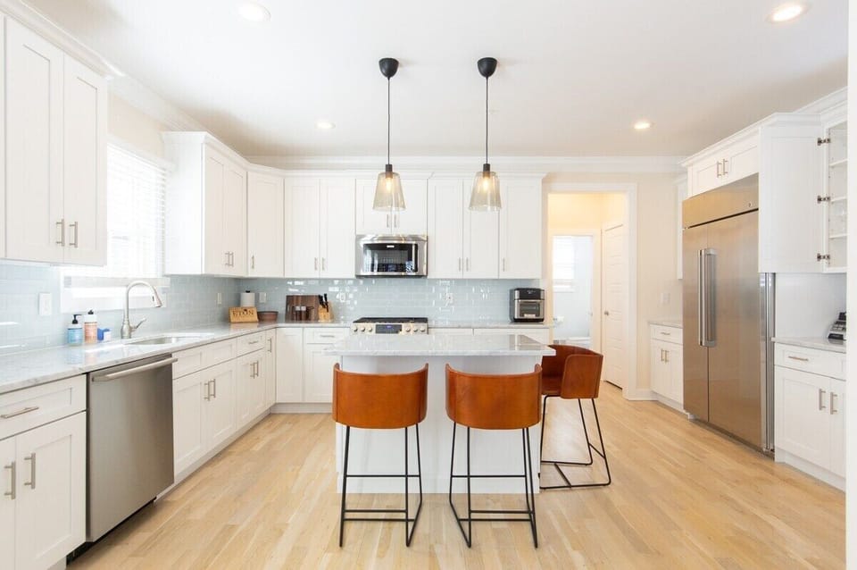 (Kitchen) The home checked all the boxes, offering exactly what was needed for a great stay: “The house itself had everything we were looking for - a beautiful kitchen with large dining room table.”