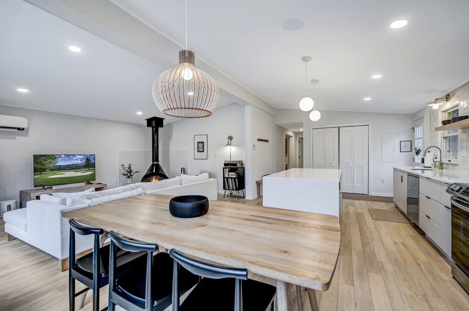 Open living space connects the kitchen, dining area, and living room