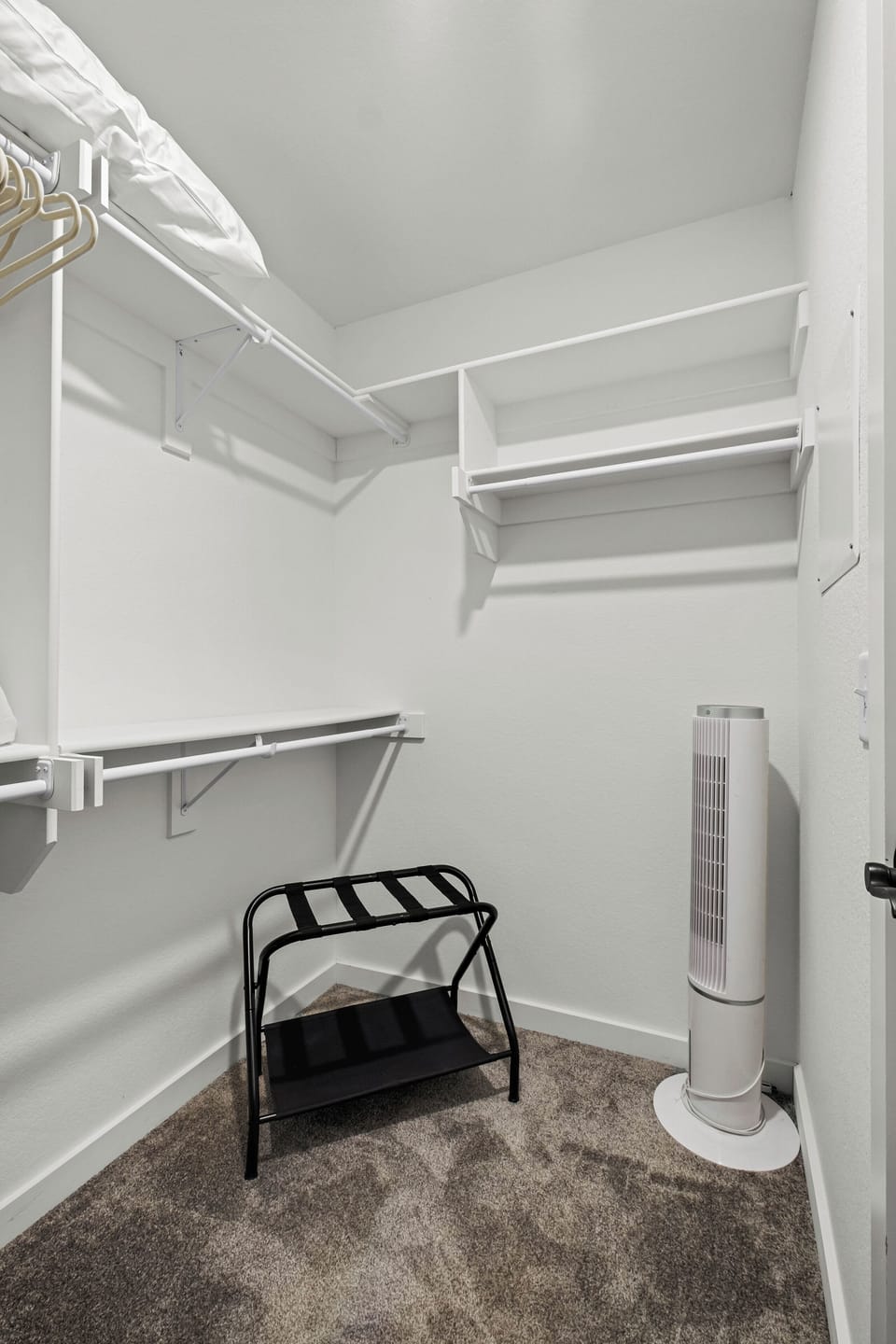 Primary bedroom walk in closet!