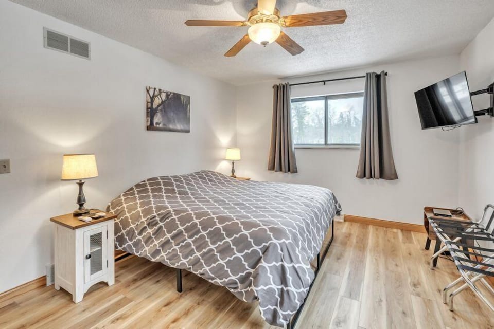 Experience true comfort in this spacious bedroom, complete with a luxurious king-size bed. Unwind with your favorite shows on the smart TV equipped with DirecTV. The room boasts ample closet space, ensuring your belongings are neatly stowed, complemented by an abundance of hangers for your convenience.