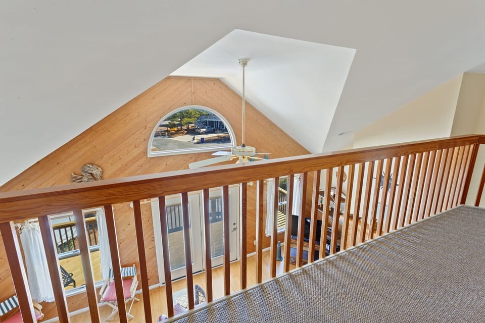 The Top-Level Loft overlooking the Living Area keeps the family connected!