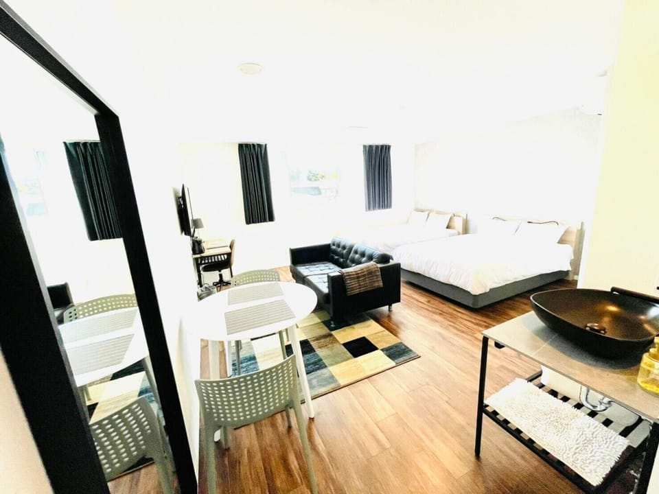 Premium bedding, desk, laptop workspace, soundproofing