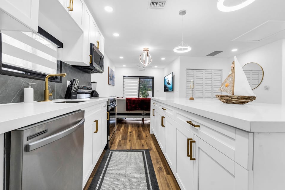Fully remodeled kitchen with appliances, pots/pans, cooking utensils, etc