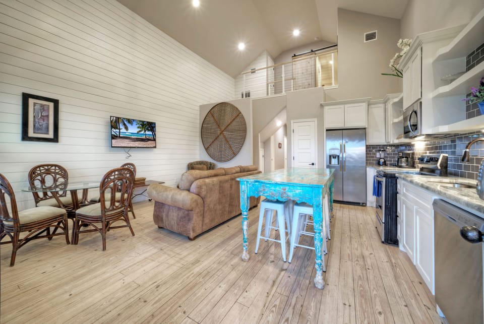 Balcony overlooks the open floor plan.