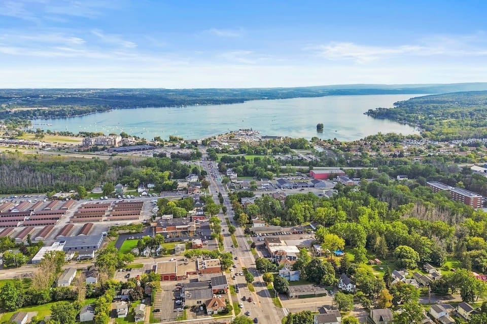 An aerial view captures a lush landscape teeming with vibrant greenery, creating a breathtaking natural tapestry.