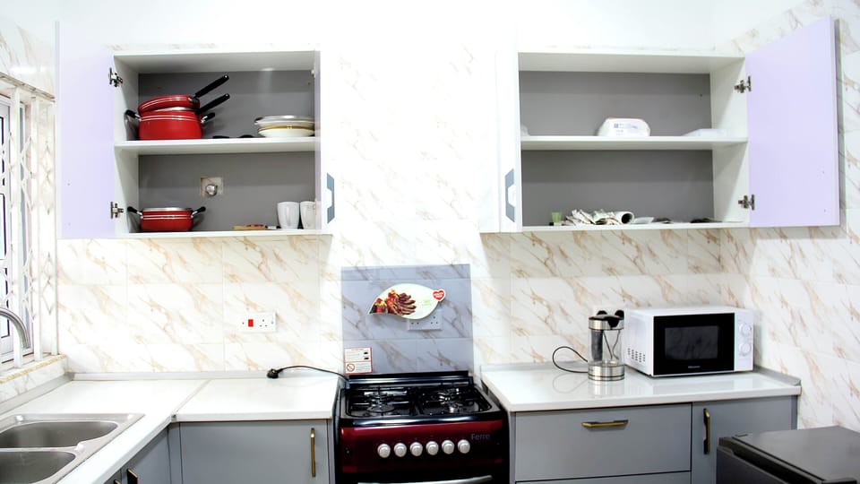 Apartment | Private kitchen | Fridge, microwave, oven, stovetop