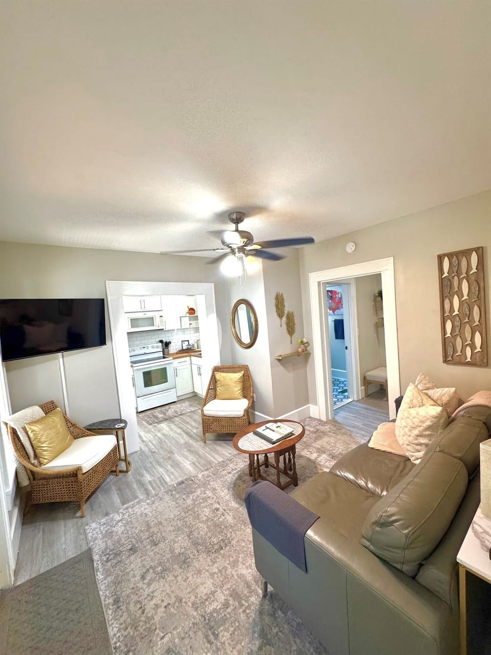 Living area open to kitchen with smart tv