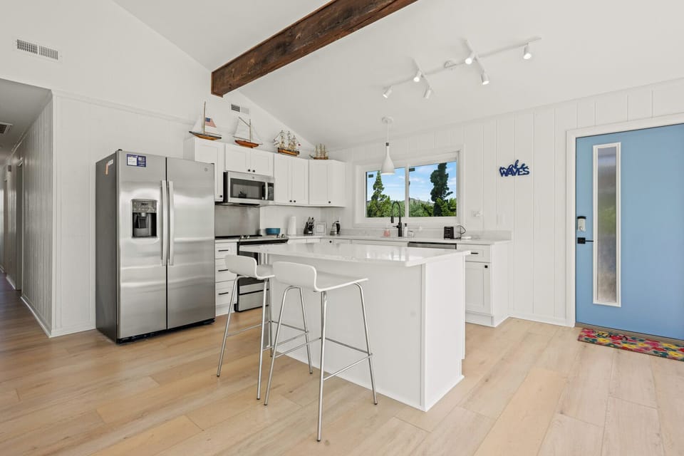 Kitchen with Bar Seating on Second Level