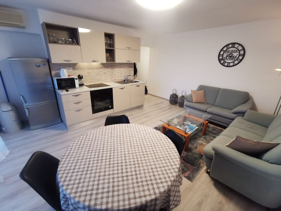 Comfort Apartment | Private kitchen | Full-size fridge, microwave, oven, dishwasher