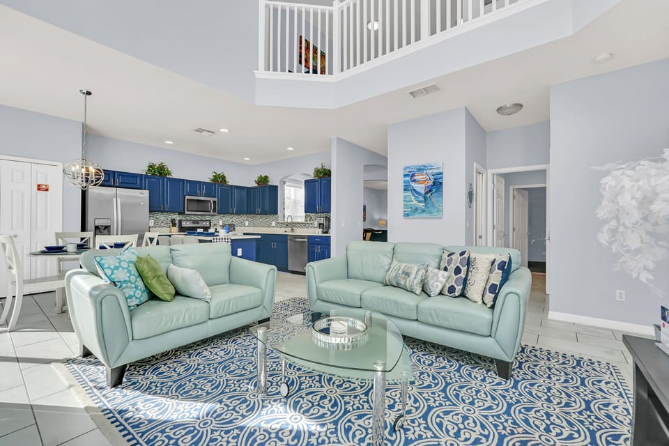 Poolside Serenity: Find serenity in our living area with a view of the outside pool, providing a calming atmosphere for your stay.