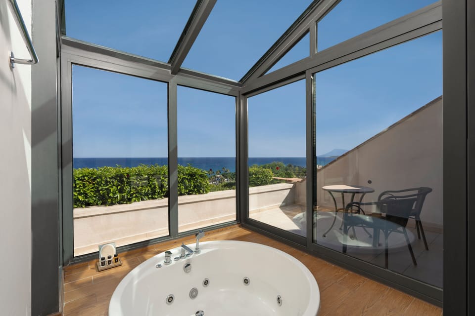 Suite, Bathtub | Free minibar, in-room safe, individually decorated