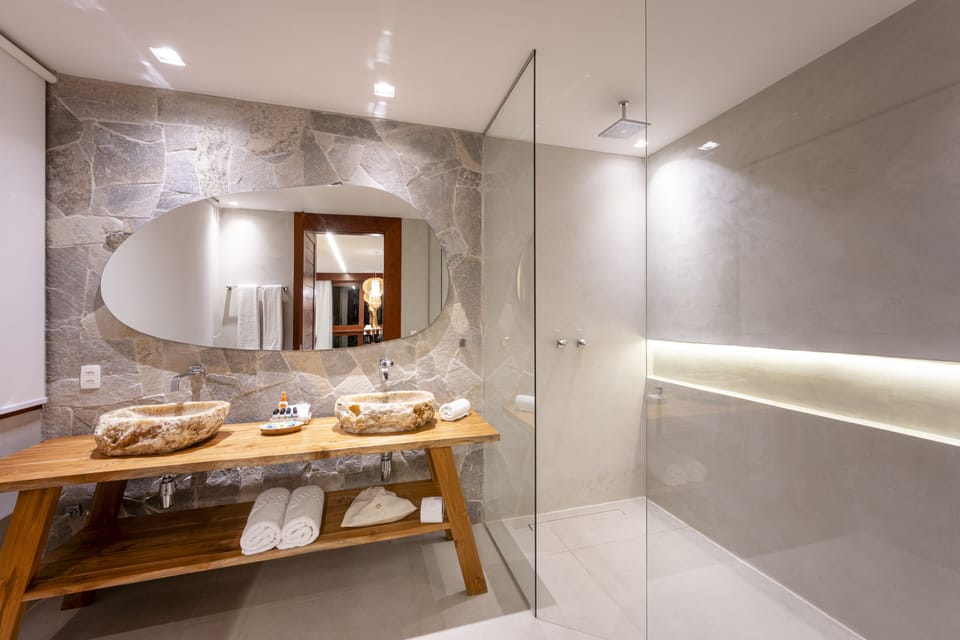 Sombra Villas | Bathroom | Hair dryer, bathrobes, towels, soap