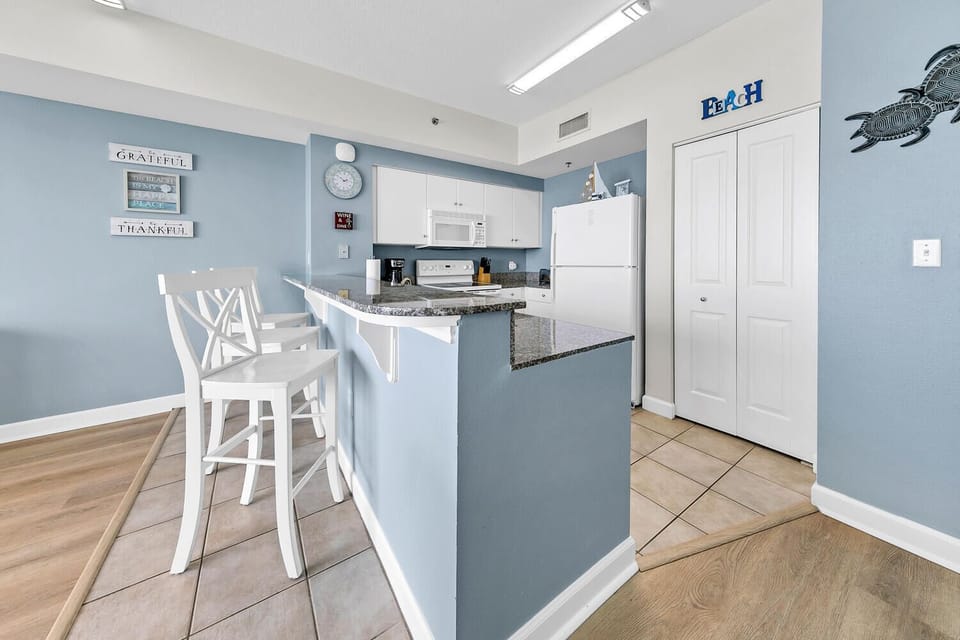 Kitchen with eat-in bar seating