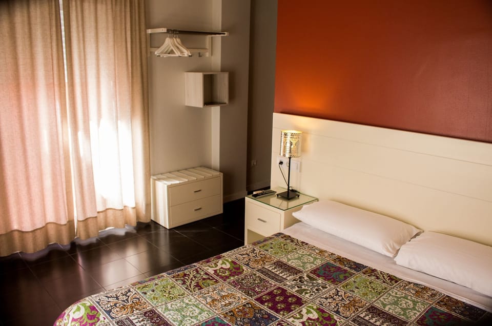 Double or Twin Room | Desk, blackout drapes, free WiFi