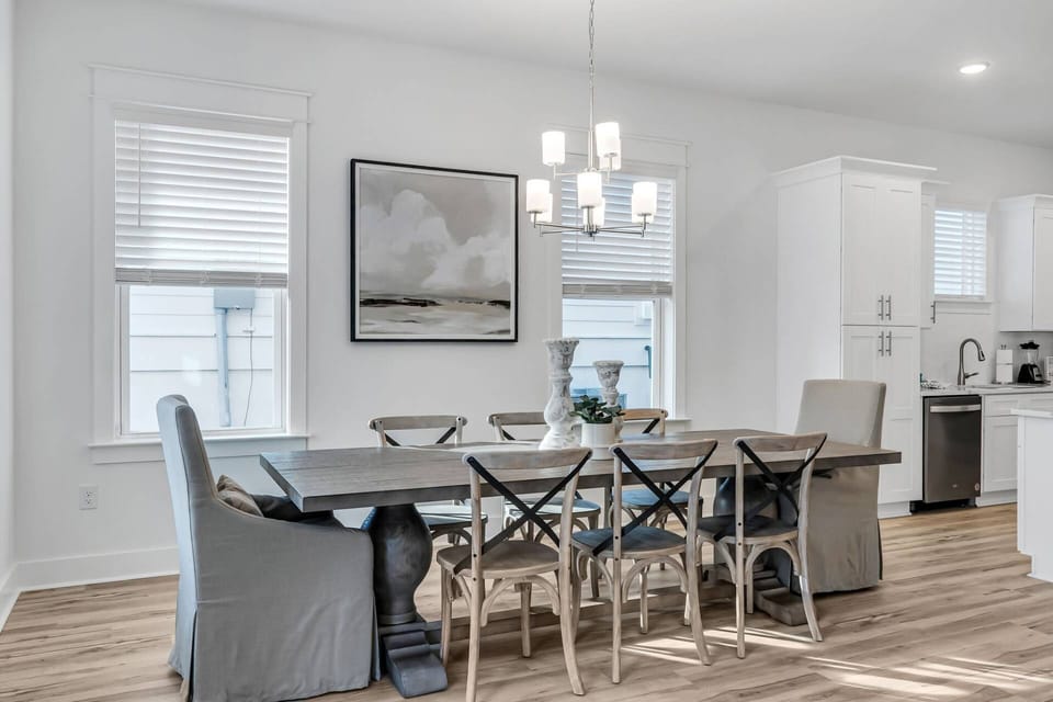 Open concept kitchen and dining area with seating for 12