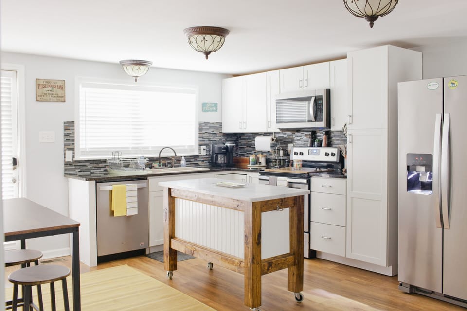 Slide from stove to table in a step — meals and conversation stay in the same easy room.