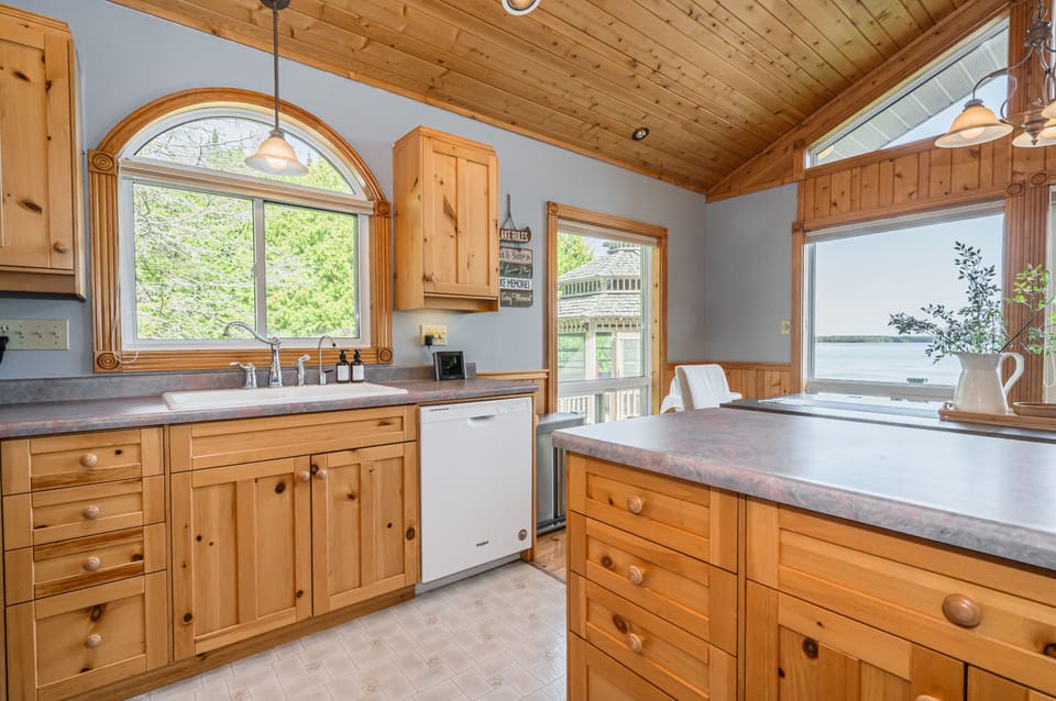 The large kitchen sink and dishwasher make cleaning up as breezy as the wind off the lake.