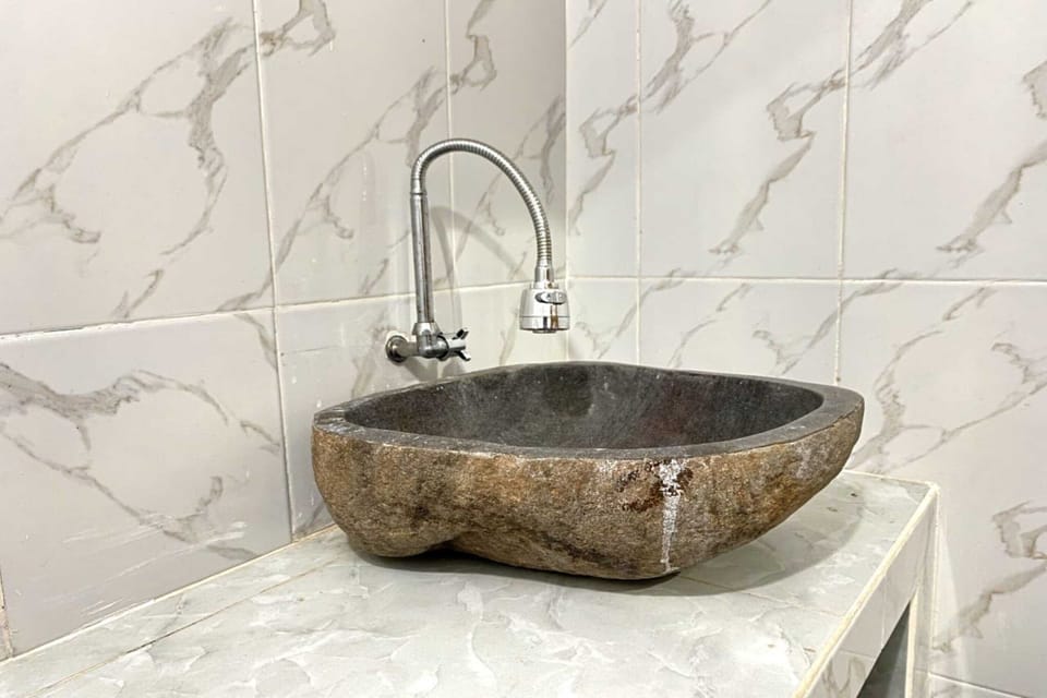 Deluxe Studio | Bathroom | Shower, soap