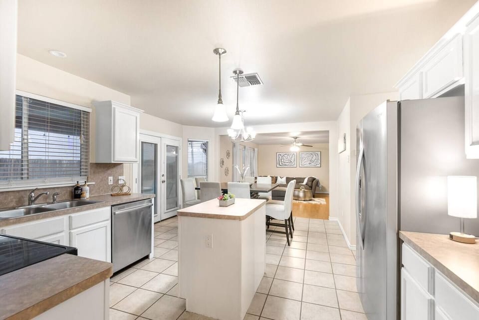 This kitchen blends modern design with practicality for your culinary adventures.