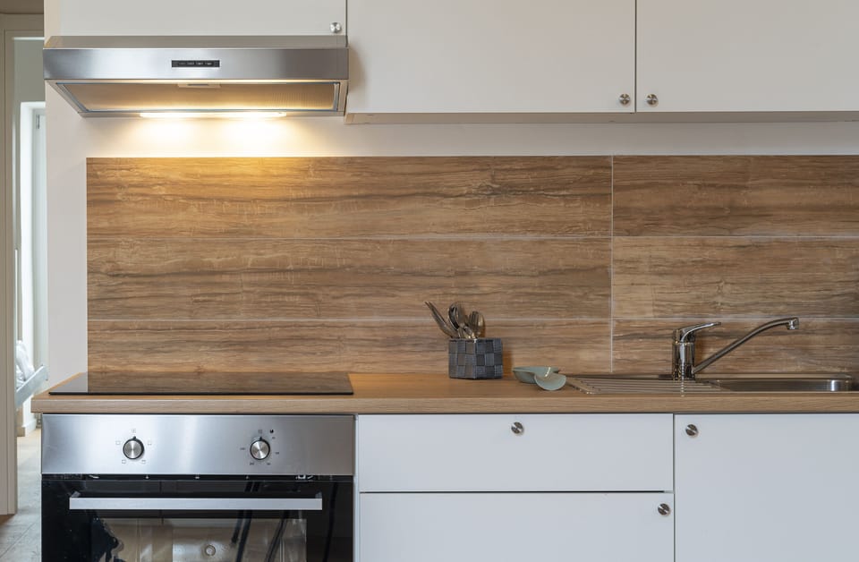 Deluxe Apartment, 2 Bedrooms, Private Bathroom, Executive Level | Private kitchen | Coffee/tea maker, electric kettle, dining tables