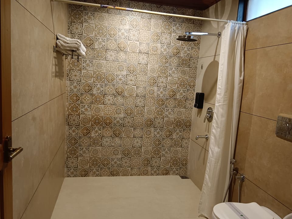 Kerala Fusion Room | Bathroom | Towels