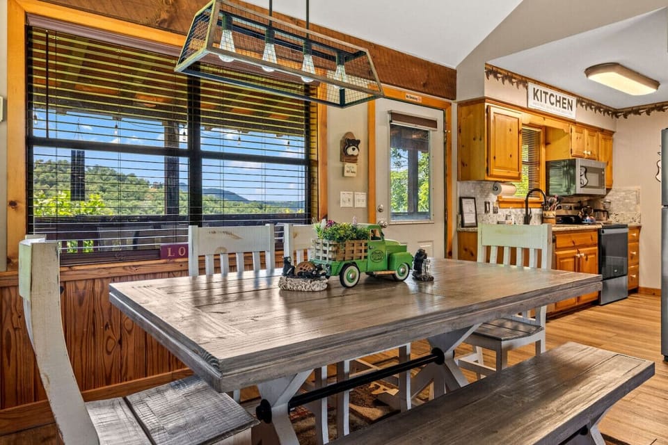 The dining table is conveniently located just off the kitchen area.