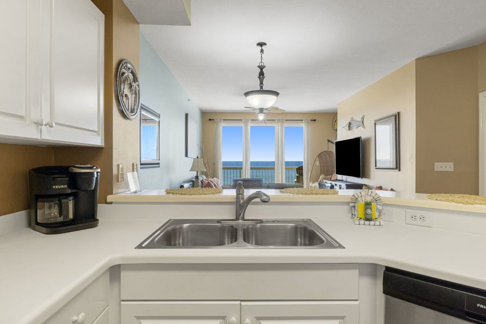 The fully equipped kitchen features stainless-steel appliances, and everything you need to cook meals for family and friends.