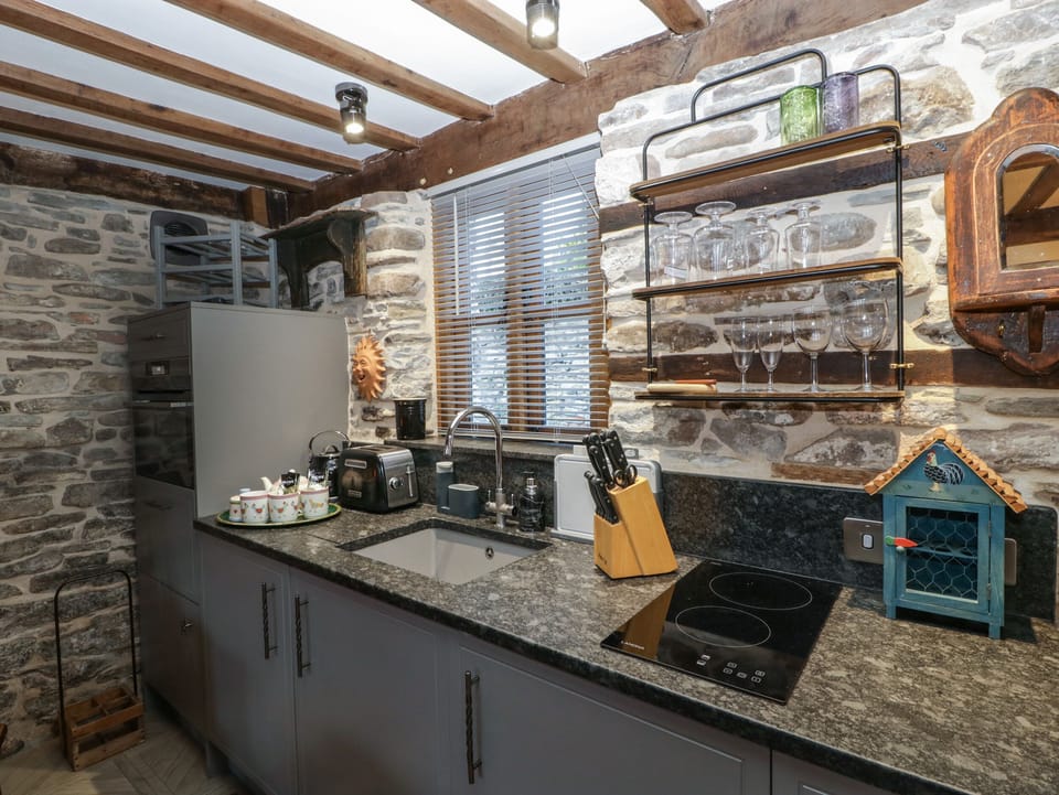 Fridge, electric kettle, toaster, cookware/dishes/utensils