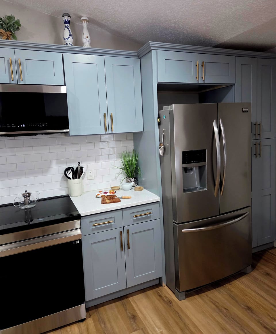 Plenty of storage for your groceries with condiments provided in fridge 
